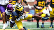 Michigan wide receiver Cornelius Johnson makes a catch against East Carolina defensive back Shavon Revel during the second half of U-M's 30-3 win on Saturday, Sept. 2, 2023, at Michigan Stadium.