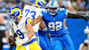 Detroit Lions defensive end Marcus Davenport (92) pressures Los Angeles Rams quarterback Matthew Stafford (9)