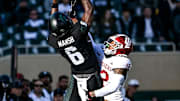 Michigan State's Nick Marsh, left, makes a catch as Indiana's Terry Jones Jr. defends during the first quarter on Saturday, Nov. 2, 2024, at Spartan Stadium in East Lansing.