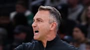 Toronto Raptors head coach Darko Rajakovic reacts during the first half against the Boston Celtics.