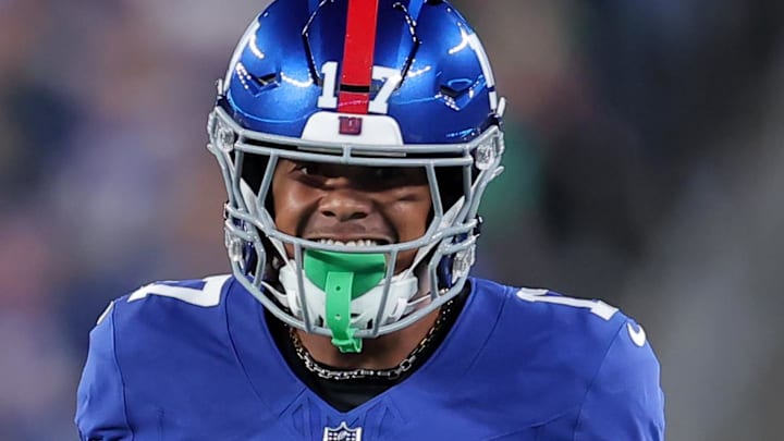 Oct 9, 2025; East Rutherford, New Jersey, USA; New York Giants wide receiver Wan'Dale Robinson (17) smiles after a play against the Philadelphia Eagles during the first quarter of the game at MetLife Stadium.
