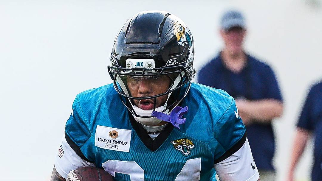 Jacksonville Jaguars Running Back Chris Rodriguez Jr. (24) carries the ball during the fourth day of NFL Training Camp in shells at the Miller Electric Center on Thursday, July 30, 2026, in Jacksonville, Fla.  [Doug Engle/Florida Times-Union]