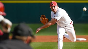 Arkansas Razorbacks pitcher Colin Fisher delivers a pitch against Louisiana-Monroe in a game at Baum-Walker Stadium in Fayetteville, Ark.