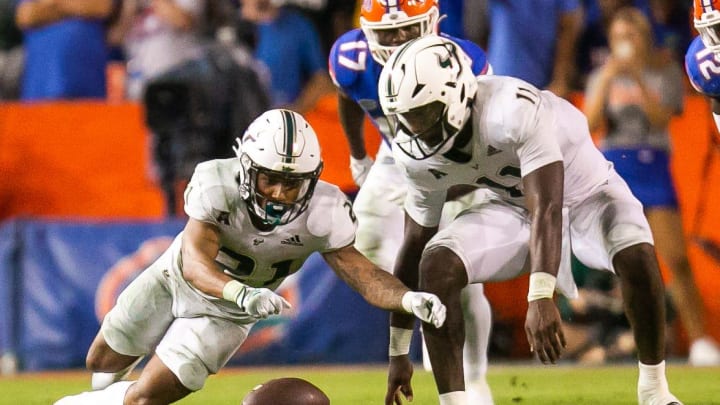 South Florida Bulls running back Michel Dukes (2) goes after a fumbled snap agains the Florida Gators  in the second half against the Bulls at Steve Spurrier Field at Ben Hill Griffin Stadium in Gainesville, FL on Saturday, September 17, 2022. Florida won 31-28 [Doug Engle/Gainesville Sun]

Ncaa Football Florida Gators Vs Usf Bulls