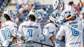 Xander Dickson, Connor Shellenberger and Dox Aitken celebrate after the New York Atlas defeated the Carolina Chaos in Charlotte.