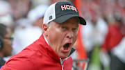 Arkansas Razorbacks athletic director Hunter Yurachek yells at officials on the sidelines during game with the Texas A&M Aggies at Razorback Stadium in Fayetteville, Ark.