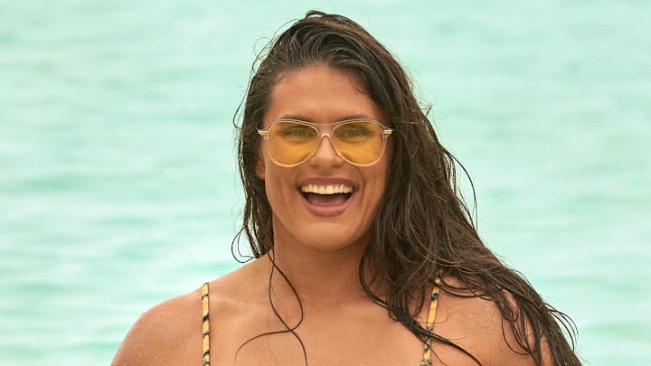 Ilona Maher was photographed by Ben Watts in Bermuda. Swimsuit by Tropic of C. Sunglasses by Bonnie Clyde. Ilona Maher was photographed by Ben Watts in Bermuda. Swimsuit by Tropic of C. Sunglasses by Bonnie Clyde.