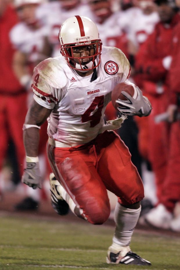 Nebraska Cornhusker  running back Cory Ross rushes against the Oklahoma Sooners during the 2004 game at Memorial Stadium.