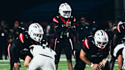 Chaminade-Madonna quarterback Malik Leonard (14) will lead the Lions into their 10th consecutive state championship game on Wednesday, Dec. 11, when they play Cardinal Newman for the Class 1A title at FIU in Miami. Chaminade-Madonna has won the last four state championships.