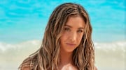 Katie Austin was photographed by Ben Watts in Bermuda. Swimsuit by Andi Bagus.