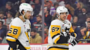 Pittsburgh Penguins defenseman Kris Letang (58) and center Sidney Crosby (87) against the Philadelphia Flyers at Wells Fargo Center.