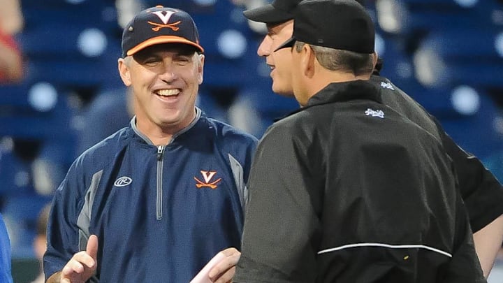Jun 15, 2015; Omaha, NE, USA; Virginia Cavaliers head coach Brian O'Connor chats with the umpires prior to the game against the Florida Gators in the 2015 College World Series at TD Ameritrade Park. Mandatory Credit: Steven Branscombe-Imagn Images