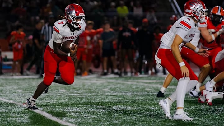 Senior running back Damian Moore (7) and the unbeaten Edgewater Eagles (9-0) flew past Dr. Phillips, 35-6, on Oct. 17. Edgewater is No. 1 in the High School on SI Top 10 Central Florida Football Rankings.