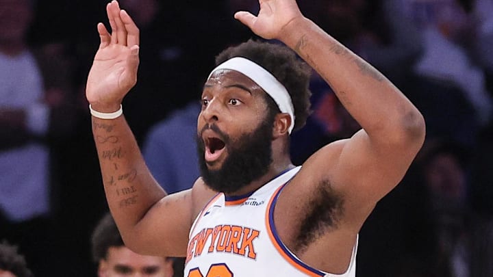 Feb 4, 2026; New York, New York, USA;  New York Knicks center Mitchell Robinson (23) reacts after getting called for a foul in the second overtime against the Denver Nuggets at Madison Square Garden. Mandatory Credit: Wendell Cruz-Imagn Images