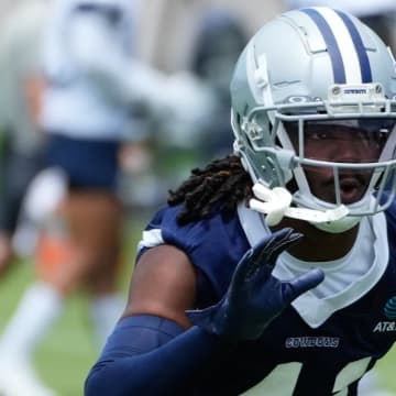 Jun 5, 2024; Frisco, TX, USA;  Dallas Cowboys cornerback Caelen Carson (41) goes through a drill during practice at the Ford Center at the Star Training Facility in Frisco, Texas. 