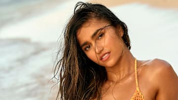 Rayna Vallandingham was photographed by Yu Tsai in Jamaica. Swimsuit by Andi Bagus.