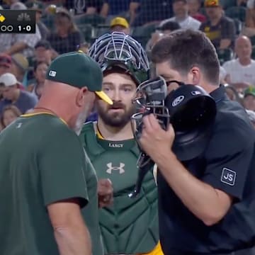 Athletics manager Mark Kotsay was tossed from Saturday night's game. 