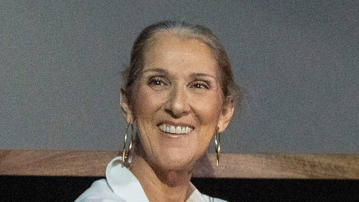 Celine Dion laughs during the TGL match between Jupiter Links GC and Atlanta Drive GC