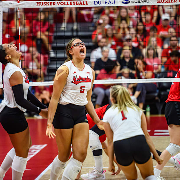 Rebekah Allick (5) celebrates a block. 