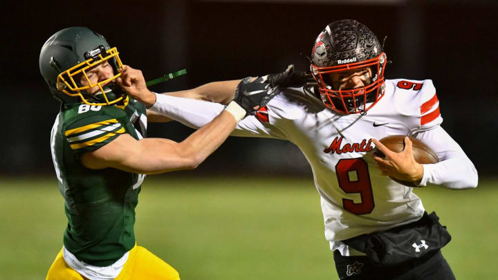 Monticello's Luke Emmerich tries to avoid a tackle by Kolton Kunerth of Sauk Rapids-Rice during the first half of the game Wednesday, Oct. 19, 2022, in Sauk Rapids. 