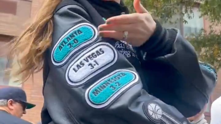 New York Liberty guard Sabrina Ionescu shows off her championship jacket. New York Liberty guard Sabrina Ionescu shows off her championship jacket.