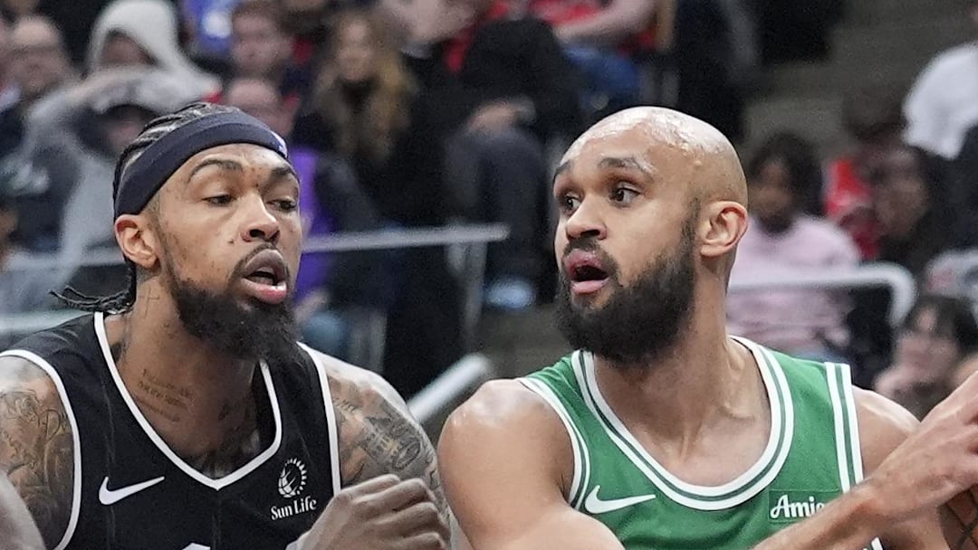 Boston Celtics guard Derrick White drives to the basket against Toronto Raptors forward Brandon Ingram