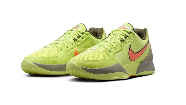 Side view of green Nike Ja sneakers.