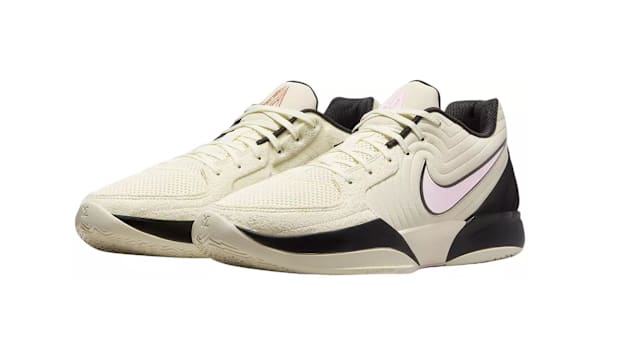 Side view of pink Nike Ja sneakers.