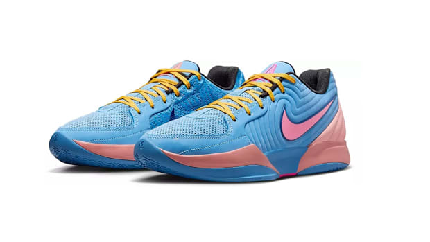 Side view of blue Nike Ja sneakers.