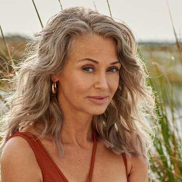 Kathy Jacobs was photographed by Yu Tsai in Tampa, Fla. Swimsuit by BFYNE. Earrings by 8 Other Reasons.