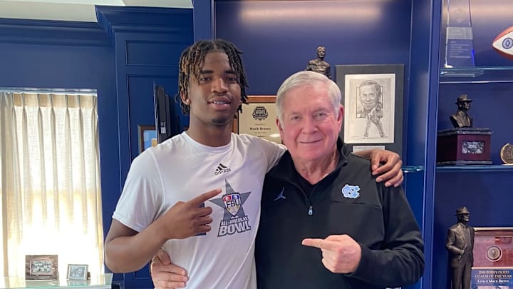 Zelus Hicks with former Texas coach Mack Brown