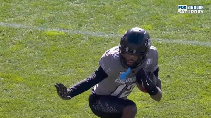 Colorado's Travis Hunter Penalized for Hitting Heisman Trophy Pose After  Interception