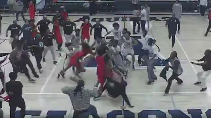 Inglewood and Aquinas boys basketball teams get into a bench-clearing scuffle after a game on Monday, Jan. 27, 2026.