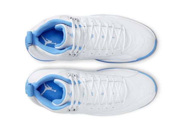 White and blue Air Jordan sneakers.