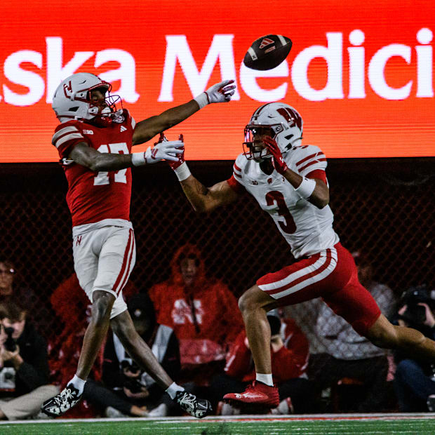 Dylan Raiola's pass is thrown behind Jacory Barney Jr., who is unable to make the catch. 