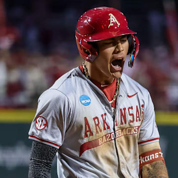Shortstop Wehiwa Aloy after hitting a homer in the Fayetteville Regional against the Creighton Bluejays in a winner's bracket game. The Razorbacks won 12-1