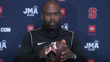 October 13, 2025; Syracuse, New York, USA; Syracuse coach Fran Brown, holding his beloved football, addresses the media at his weekly news conference at the John A. Lally Athletics Complex. Mandatory Credit: Screen shot courtesy Syracuse University Athletic Communications 