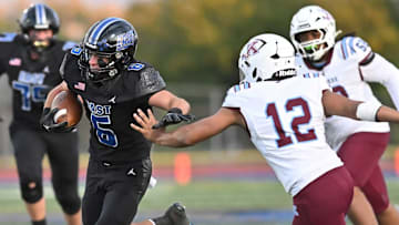 No. 2 Lincoln-Way East blew past Kankakee, 41-0, to improve to 2-0, early in the 2025 Illinois high school football season.