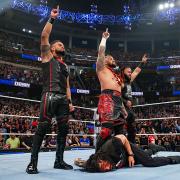 The Bloodline (Solo Sikoa, Jacob Fatu, and Tama Tonga) leave Roman Reigns laying at the end of WWE Friday Night SmackDown.