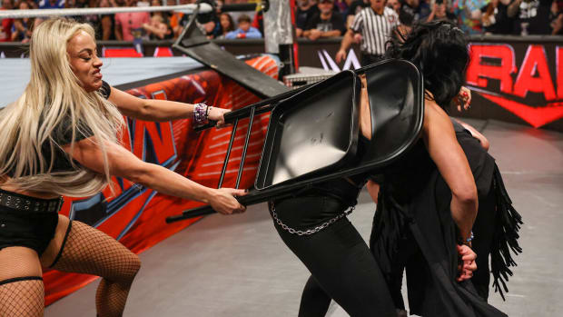 Liv Morgan attacks Rhea Ripley with a steel chair during the August 19, 2024 edition of WWE Monday Night Raw.