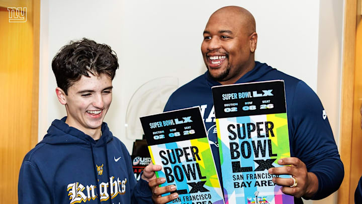 New York Giants quarterback defense lineman Dexter Lawrence surprised Northern Valley wide receiver Sam Bilali in front of his family and teammates, presenting him with the grand prize trophy, tickets to this year’s Super Bowl, and a $10,000 equipment grant for the Northern Valley Regional High School at Old Tappan football program. New York Giants quarterback defense lineman Dexter Lawrence surprised Northern Valley wide receiver Sam Bilali in front of his family and teammates, presenting him with the grand prize trophy, tickets to this year’s Super Bowl, and a $10,000 equipment grant for the Northern Valley Regional High School at Old Tappan football program.