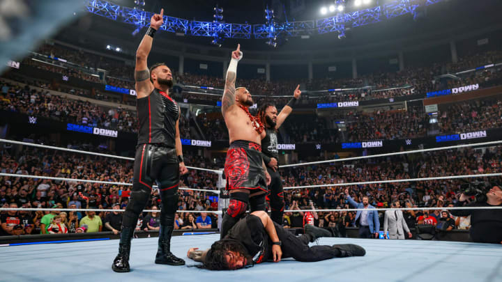 The Bloodline (Solo Sikoa, Jacob Fatu, and Tama Tonga) leave Roman Reigns laying at the end of WWE Friday Night SmackDown.