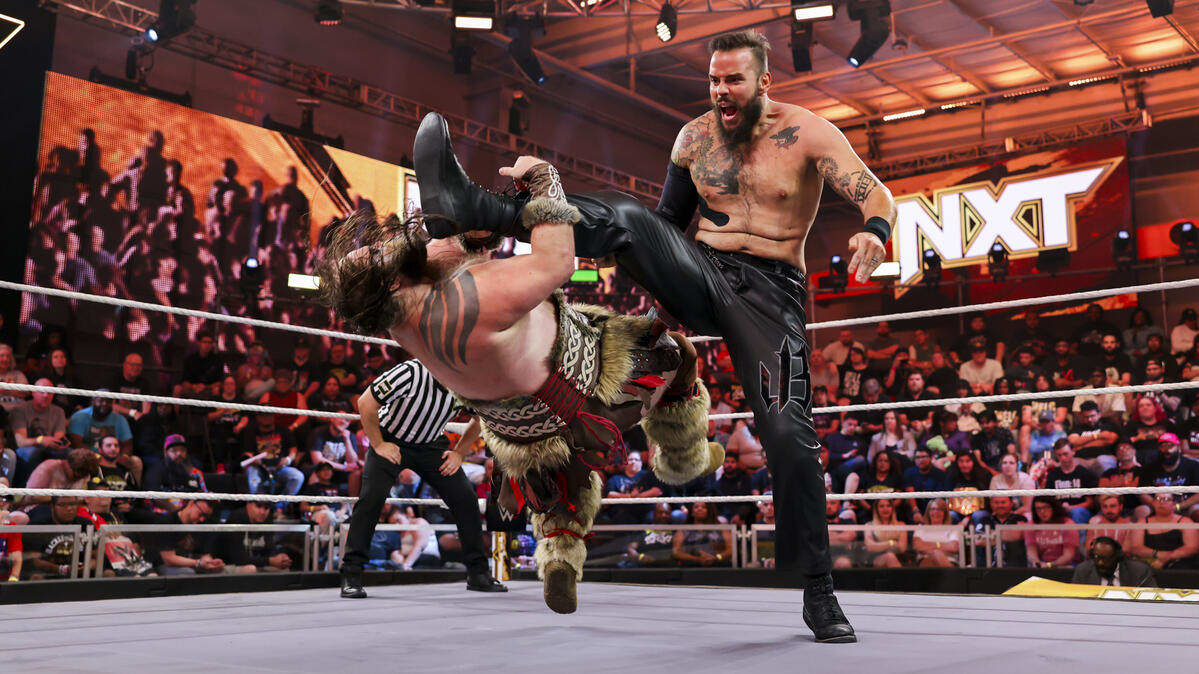 Josh Briggs delivers a kick to Ivar on WWE's NXT