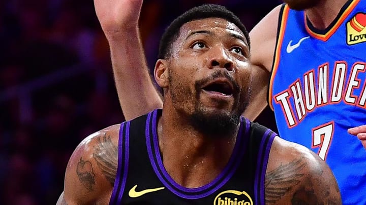 May 11, 2026; Los Angeles, California, USA; Los Angeles Lakers guard Marcus Smart (36) moves to the basket against Oklahoma City Thunder center Chet Holmgren (7) during the first half in game four of the second round of the 2026 NBA Playoffs at Crypto.com Arena. Mandatory Credit: Gary A. Vasquez-Imagn Images