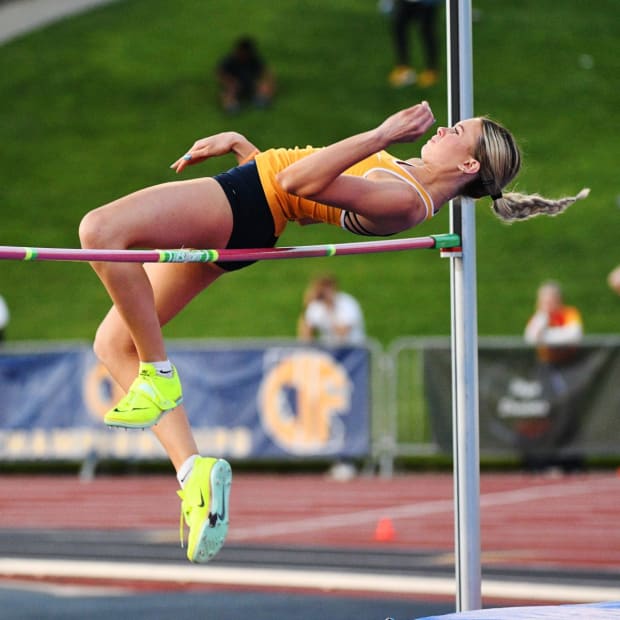 Menlo School's Summer Young, the daughter of NFL Hall of Famer Steve Young, clears 5-feet, 8-inches in the high jump at the CIF State Track and Field Championships at Buchanan High School in Clovis. 