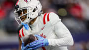 Duncanville (Texas) wideout Dakorien Moore, an Oregon commit, carries the ball during the 2023 UIL 6A D1 state title against North Shore.