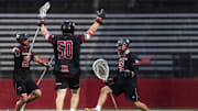 April 5th, 2025, SHI Stadium, Piscataway, NJ:  Rutgers goalie Cardin Stoller celebrates with teammates in a lacrosse match versus Maryland. 