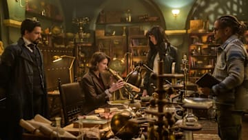 The Librarians: The Next Chapter -- Image Number: LIB102_0209r -- Pictured (L-R): Callum McGowan as Vikram Chamberlain, Olivia Morris as Lysa Pascal, Jessica Green as Charlie Cornwall, and Bluey Robinson as Connor Green -- Photo: Aleksandar Letic/The CW -- © 2024 The CW Network, LLC. All Rights Reserved.