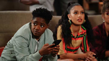 All American -- "C.R.E.A.M (Cash Rules Everything Around Me" -- Image Number: ALA415a_0258r.jpg -- Pictured (L-R): Bre-Z as Coop and Samantha Logan as Olivia Baker -- Photo: Troy Harvey/The CW -- (C) 2022 The CW Network, LLC. All Rights Reserved.
