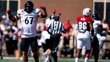 Cincinnati Bearcats offensive lineman Luke Kandra (67) flexes after a defensive stop in the fourth quarter of the College Football game against the Miami Redhawks at Yager Stadium in Cincinnati on Saturday, Sept. 14, 2024.